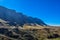 Greenery in Sani pass under blue sky near kingdom of Lesotho South Africa border near KZN and Midlands meander