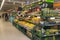 Greengrocer`s the supermarket chains, lemons, pineapples, bananas, oranges, watermelons  prilavka, the people in the shop