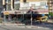 Greengrocers shop with faded red sunshade canopy