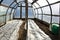 Greenhouse hothouse in early spring after vegetable seeding