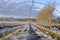 A greenhouse in the winter. Nothing grows in the tunnel