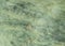 Greenish rough stone surface background