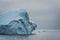 Greenland. The biggest glacier on a planet Jakobshavn. Huge icebergs of different forms in the gulf. Studying of a