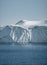 Greenland. The biggest glacier on a planet Jakobshavn. Huge icebergs of different forms in the gulf. Studying of a