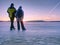 Greenland hiking travel tourist lovers with hold hands