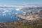 Greenland view of colorful houses in Ilulissat City and icefjord. Tourist destination in the arctic.