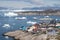 Greenland view of colorful houses in Ilulissat City and icefjord. Tourist destination in the arctic.