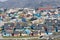 Greenland view of colorful houses in Ilulissat City and icefjord. Tourist destination in the arctic.