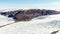 Greenlandic melting ice sheet glacier aerial view from the plane, near Kangerlussuaq, Greenland