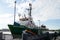 Greenpeace Arctic Sunrise ship on bordeaux harbor green boat