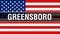 Greensboro city on a USA flag background, 3D rendering. United states of America flag waving in the wind. Proud American Flag