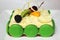 Greentea cake with macaroon and fresh fruit