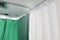 Greenâ€‹ andâ€‹ whiteâ€‹ curtainâ€‹sâ€‹ inâ€‹ theâ€‹ waitingâ€‹ roomâ€‹ atâ€‹ theâ€‹ hospital.