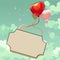 Greeting background with a sign flying on balloons hearts