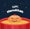 Greeting card with funny Hanukkah traditional donut frying in an oil pot.