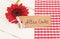 Greeting card with german text, Alles Gute, means best wishes with red flower decoration