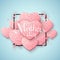 Greeting card on Happy Mother`s Day. Brilliant hearts from pink glitters in a frame on a light blue background. Luxury background