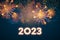 Greeting card Happy New Year 2023. Holiday web banner or billboard with text 2023 on the background of fireworks. Vector