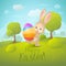 Greeting card with text â€œHappy Easter!â€. Cartoon spring landscape with cute rabbit and colored egg in field.
