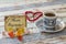 Greeting card writing `Happy Eid` in Turkish with sugar candies, turkish coffee, and heart shaped rosary