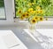 Greeting mockup scene on window sill of rural house. Blank paper, bouquet of wild meadow