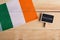 Greeting for traveler concept - Ireland Flag and blackboard with text Welcome