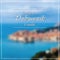 Greetings from Dubrovnik postcard with blurry image in back