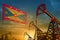 Grenada oil industry concept. Industrial illustration - Grenada flag and oil wells against the blue and yellow sunset sky