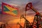 Grenada oil industry concept. Industrial illustration - Grenada flag and oil wells with the red and blue sunset or sunrise sky