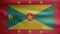 Grenadian flag waving in the wind. Close up of Grenada banner blowing soft silk