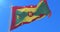 Grenadian flag waving at wind in slow in blue sky, loop