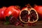 Grenadine fruits and seeds on wooden table