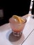 Grenadine syrup with yogurt and lemon slice for drink mocktail