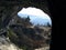 Grenoble, Bastille fortress. The view from the dark cave at a height outward to the city Ancient caves. France 2009