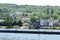 Grevenmacher, Luxembourg - 07 11 2023: View across River lock Grevenmacher with a factory on the other side