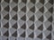 Grey acoustic foam rubber. Soundproof pyramids, full frame