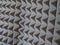 Grey acoustic foam rubber. Soundproof pyramids, full frame