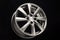 grey alloy wheel, modern auto parts. black background