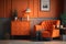 Grey armchair next to lamp in orange vintage living room interior with sofa next to cabinet. Generative AI