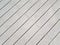 Grey artificial wood decking boards or lumber