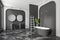 Grey bathroom interior with tub, double sink with accessories