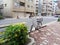 A grey bicycle parking at road side