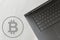 Grey bitcoin investing laptop top-down view for home office business concept. Cop