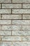 Grey brick wall texture background. Modern construction. Beautiful new bricks made of stones.