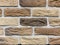 Grey and brown brick stone background, stand wall pattern texture. Brickwork. Construction made of bricks