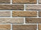 Grey and brown brick stone background, stand wall pattern texture. Brickwork. Construction made of bricks