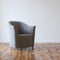 Grey Cozy Armchair In Empty Room Interior With Parquet