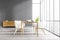 Grey dining room with wooden furniture and commode near window