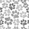 Grey doodle paw print seamless fabric design pattern