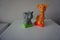 Grey elephant and orange giraffe. Plastic figures